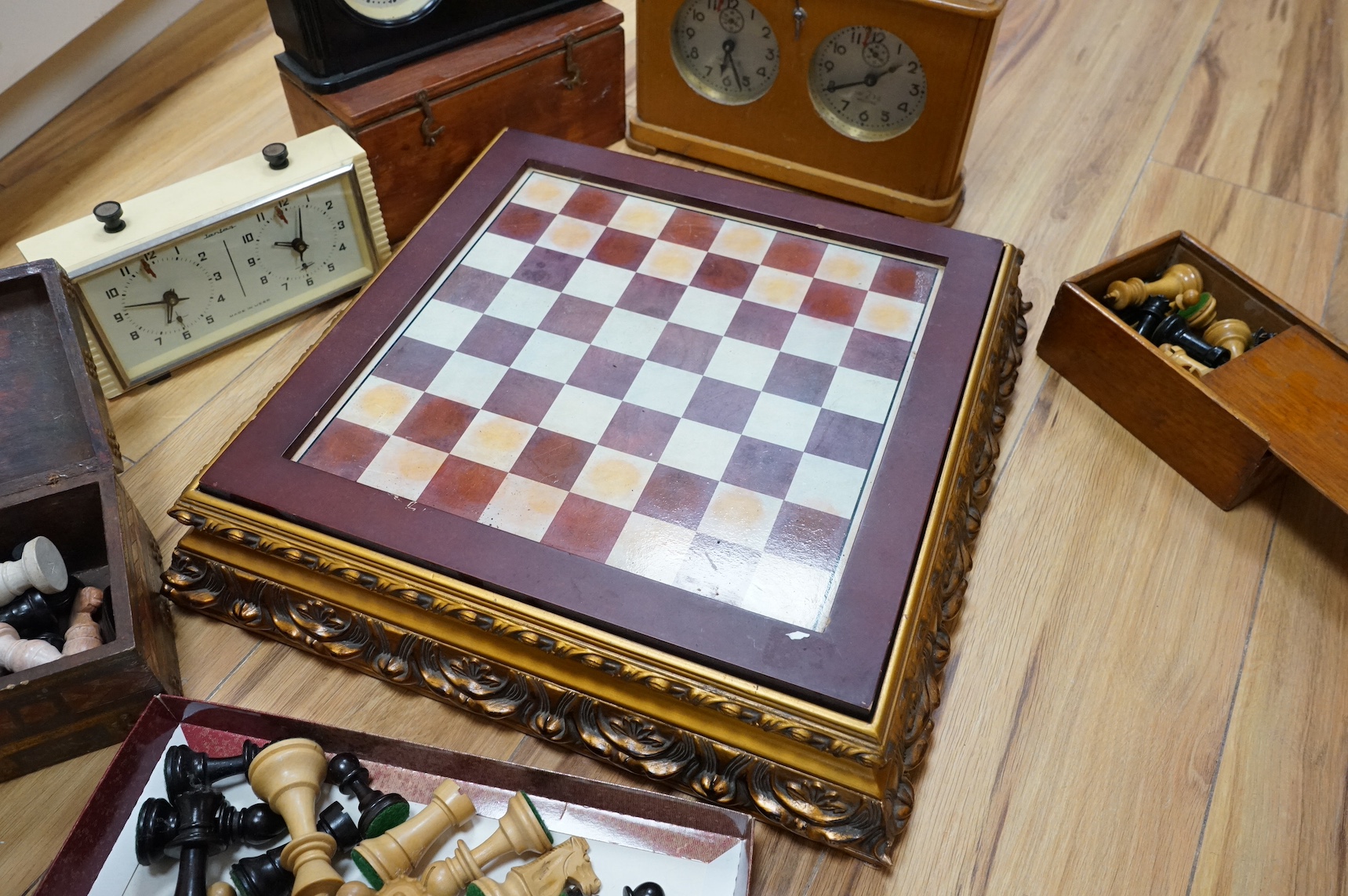 A collection of various chess boards, chess timers and pieces, etc. Condition - varies